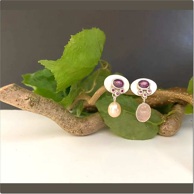 Silberne Ohrstecker mit Sternrubin 