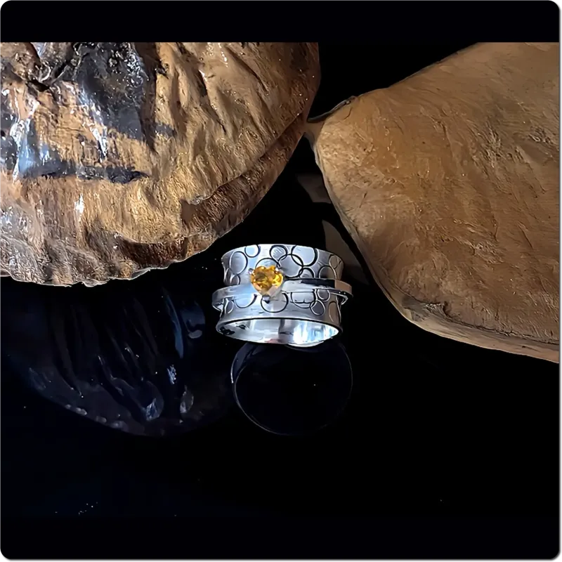 Silberner Spinner Ring mit Citrin-Herz Gr. 57